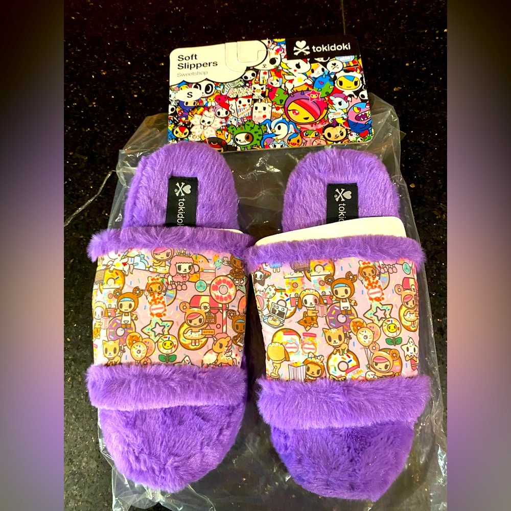 Never worn pair of Tokidoki slippers, purple in new condition with packaging